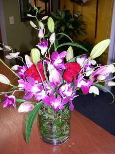 Dendrobium Orchids and Red Roses